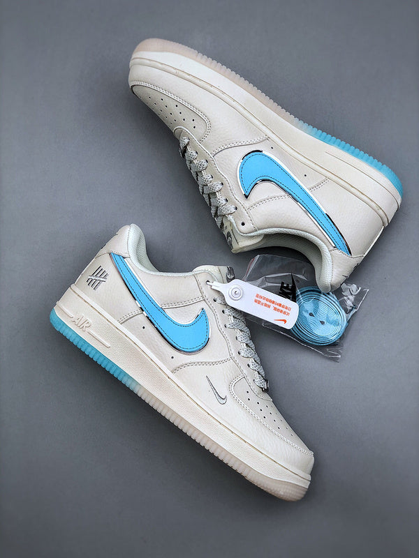 Tênis Nike Air Force 1'07 Low "LXX Univeristy Blue" - Rei da Pelada