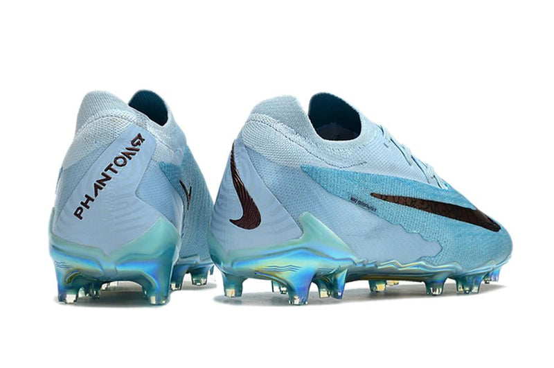 Chuteira Nike Phantom GX Low Elite FG Campo