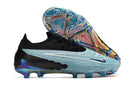 Chuteira Nike Phantom GX Low Elite FG Campo