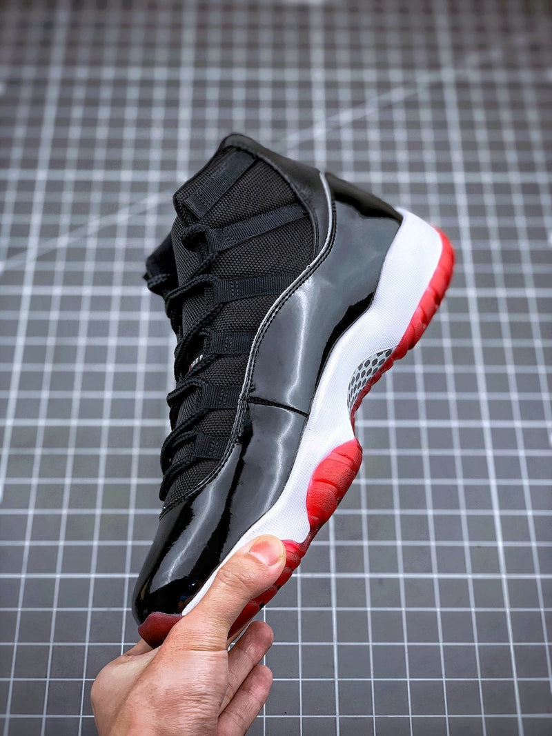 Tênis Nike Air Jordan 11 Bred - Rei da Pelada